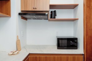 Deluxe Double or Twin Room | Dapur peribadi | Peti sejuk, tisu