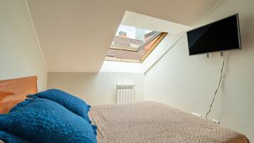 2 habitaciones, tabla de planchar con plancha, wifi y ropa de cama