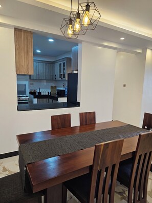 Dining - 2 bedroom condo in Munyonyo, Kampala. scenic views from our rooftop (Kampala)