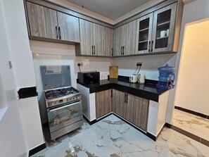 Een magnetron, een oven, een kookplaat