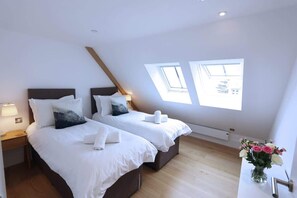 3 bedrooms, iron/ironing board, travel cot, WiFi