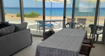 Brand new beachfront house in Koutsouras — 30 steps to crystal-clear water!