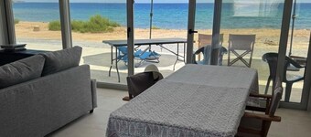 Brand new beachfront house in Koutsouras — 30 steps to crystal-clear water!