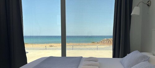 Brand new beachfront house in Koutsouras — 30 steps to crystal-clear water!
