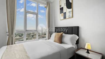 Apartment, 2 Bedrooms, City View | Desk, laptop workspace, iron/ironing board, free WiFi