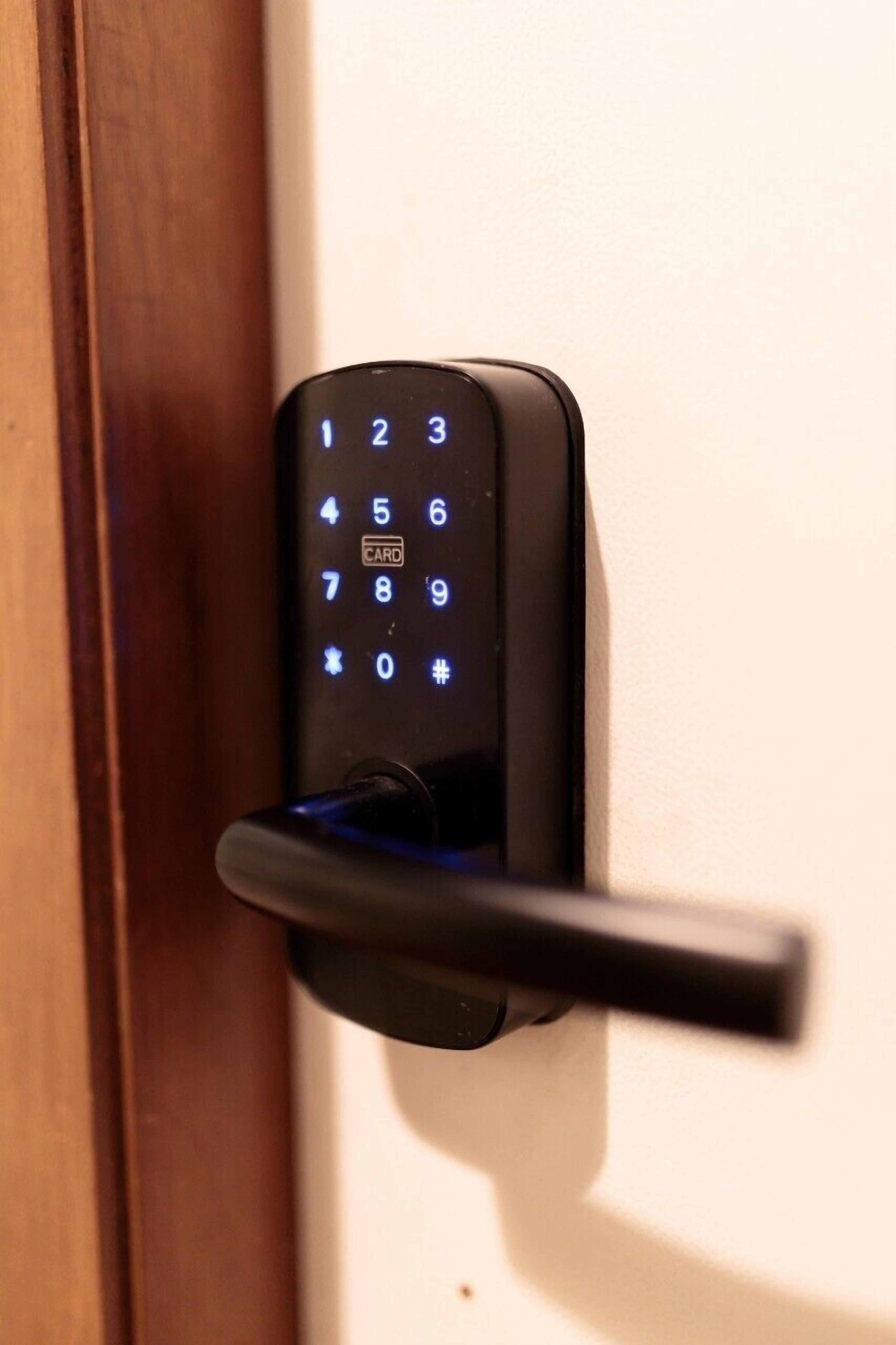A door with a numeric keypad lock.