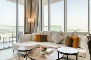 Appartement Exclusif, balcon, vue lagon | Coin séjour | TV connectée de 55 pouces avec chaînes numériques