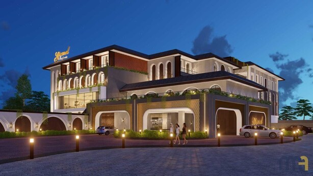 Un hôtel moderne doté d’une cour intérieure, de passages voûtés et d’une entrée imposante.