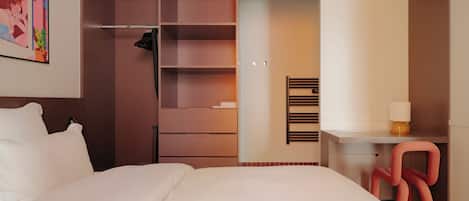 Premium bedding, memory-foam beds, desk, laptop workspace