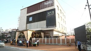 A building with a sign for 'MVR GRAND' and 'Sky Lounge'. - MVR Grand Hotel (Kanpur)