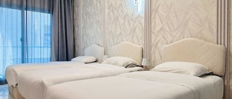 Chambre triple Deluxe | Literie de qualité, accÚs au Wi-Fi (inclus), literie fournie