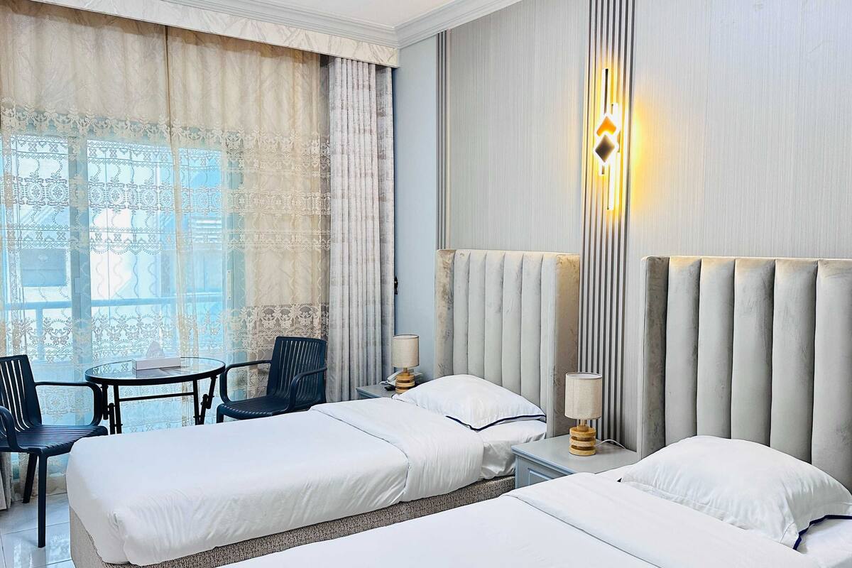 Chambre Double Deluxe, 2 lits une place | Literie de qualité supérieure, Wi-Fi gratuit, draps fournis