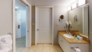Jetted bath, hair dryer, towels, soap