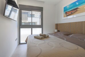 2 dormitorios, tabla de planchar con plancha, Internet y ropa de cama