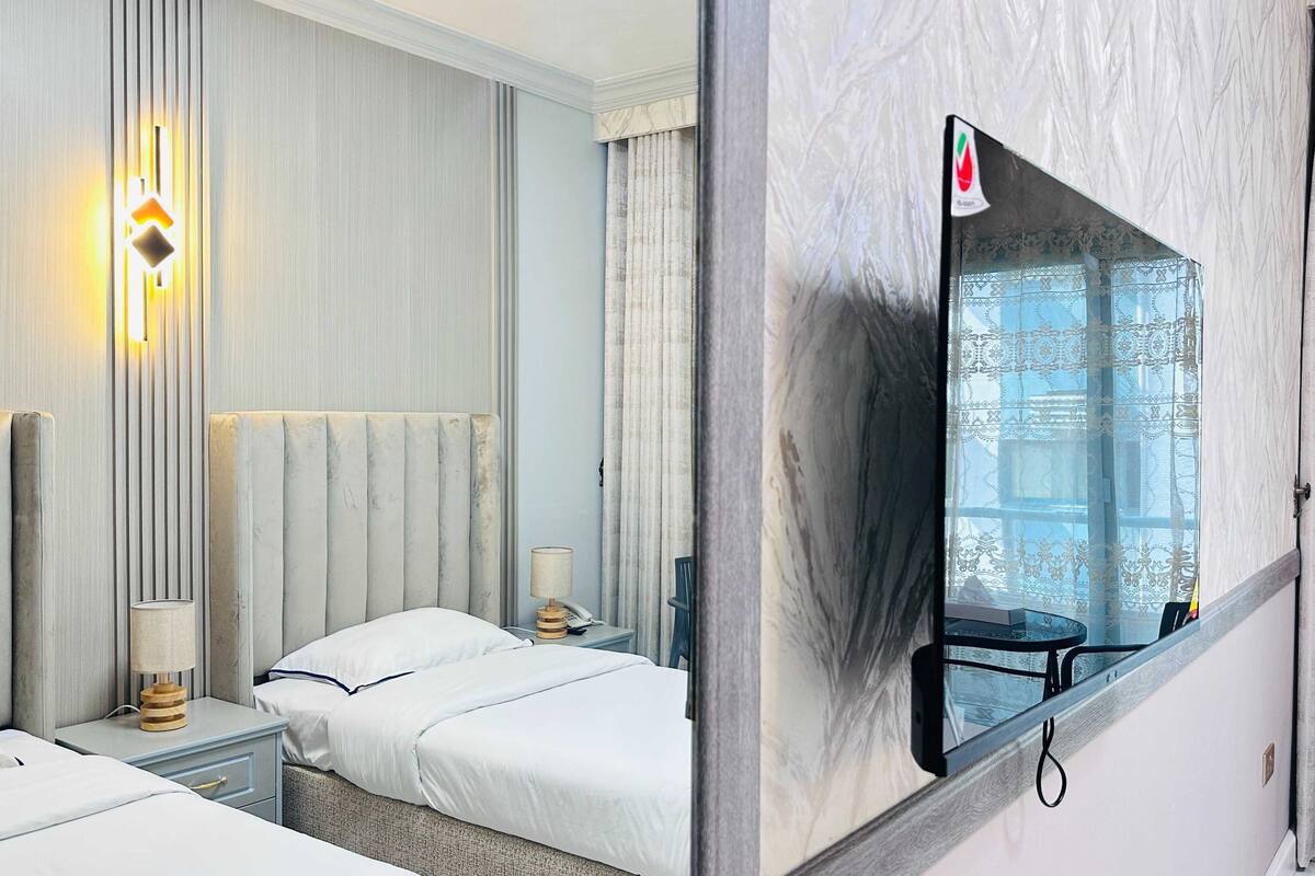 Deluxe Twin kamer | Een bureau, gratis wifi, beddengoed