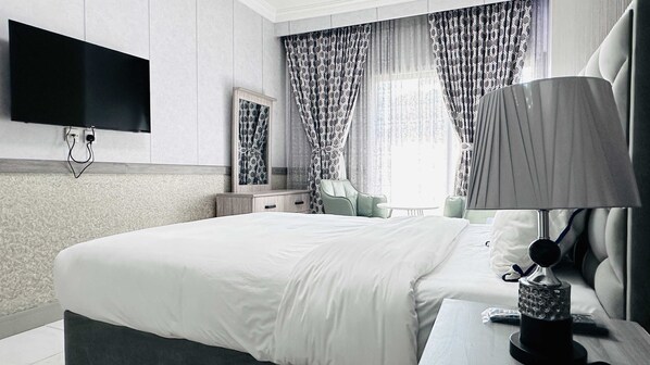 Habitació doble Deluxe, 2 llits individuals | Wifi gratuïta i roba de llit 