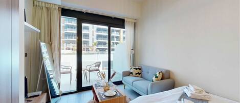 Exclusive Studio, Balcony, City View | Living room | 55-inch Smart TV with digital channels