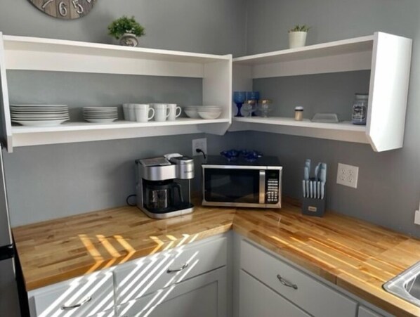 Fridge, microwave, coffee/tea maker, blender