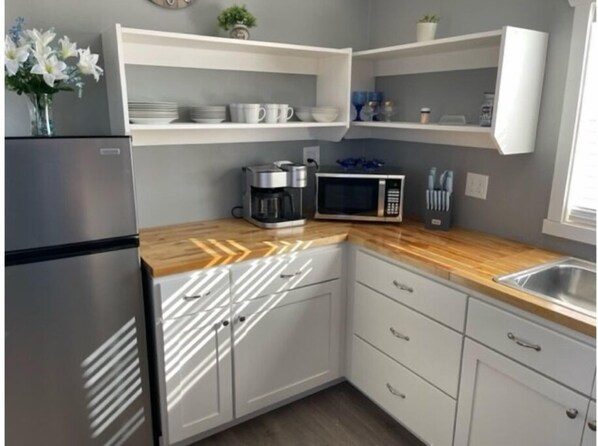 Fridge, microwave, coffee/tea maker, blender