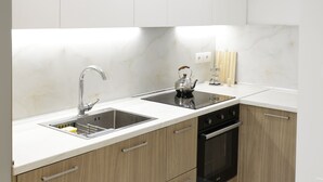 Réfrigérateur, four, plaque de cuisson, lave-vaisselle