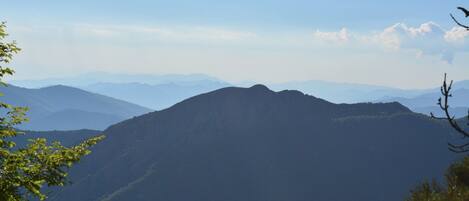 A mountain landscape with a clear sky.