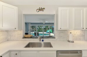 Fridge, microwave, oven, stovetop - Cape Aqua Retreat  | Classic Charm, Modern Comfort w/ Private Pool (Siesta Key)