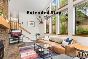 House, Multiple Beds, Patio, Garden View (1916 Winterberry Way) | Living area | 55-inch flat-screen TV with digital channels, fireplace