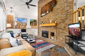 House, Multiple Beds, Patio, Garden View (1916 Winterberry Way) | Living area | 55-inch flat-screen TV with digital channels, fireplace