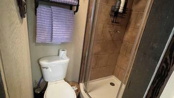 Hair dryer, towels, soap, shampoo