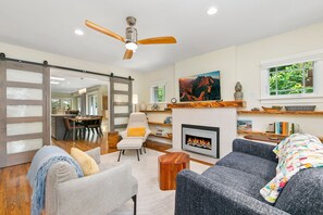 House, Multiple Beds, Patio, Garden View (500 Maple Street) | Living area | 75-inch flat-screen TV with digital channels - Maple Courtyard - Old Town w/ King Suite & Piano (Fort Collins)