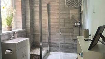 Shower, free toiletries, hair dryer, towels