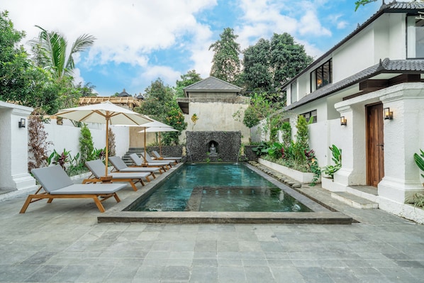 Outdoor pool, pool umbrellas, pool loungers
