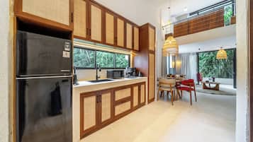 Appartement, 1 chambre, balcon, en mezzanine | Minibar, espace de travail pour ordinateur portable, rideaux occultants