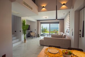 Diamond View Villa | Living area | 43-inch flat-screen TV with satellite channels