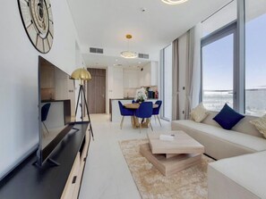 Exclusive Apartment, Balcony, Lagoon View | Living room