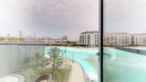 Outdoor pool, pool umbrellas, sun loungers