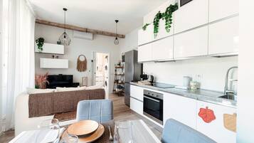 Apartment | Private kitchen | Full-sized fridge, oven, stovetop, dishwasher