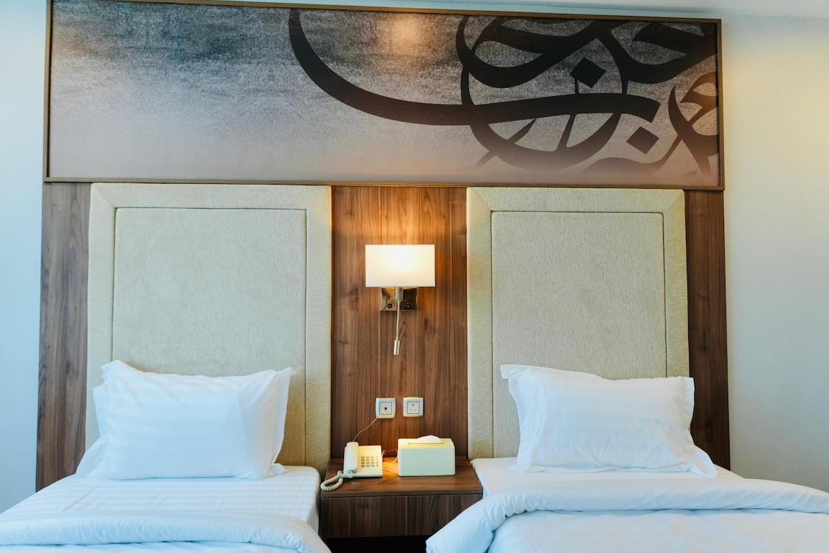 Family Quadruple Room, City View | Laptop workspace, free WiFi