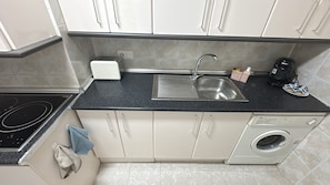 Fridge, microwave, dishwasher, coffee/tea maker