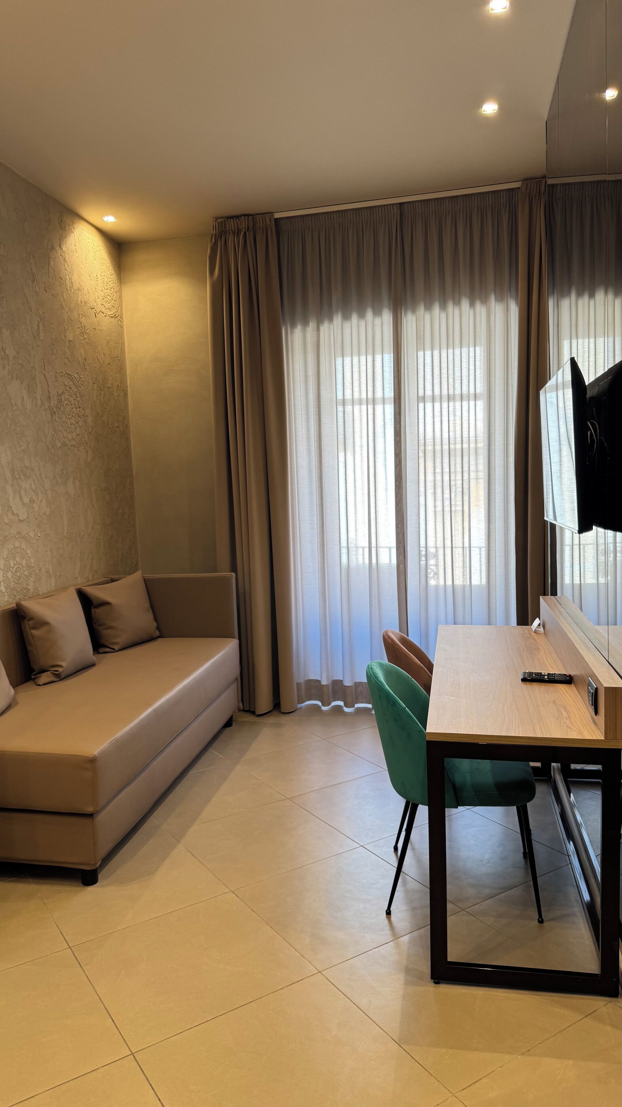 Deluxe Triple Room, Balcony, City View | Minibar, in-room safe, blackout curtains, soundproofing