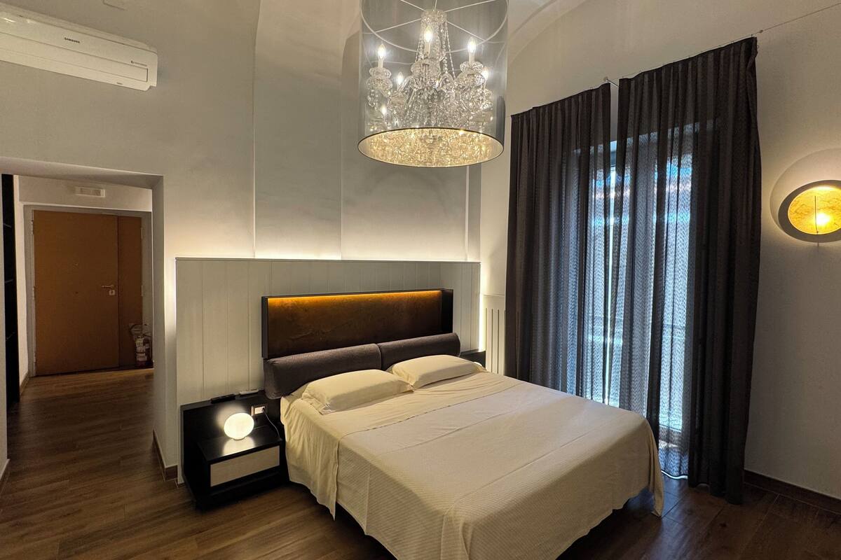 Junior Suite, 1 King Bed with Sofa bed, Non Smoking, Housekeeping | In-room safe, blackout drapes, soundproofing, iron/ironing board