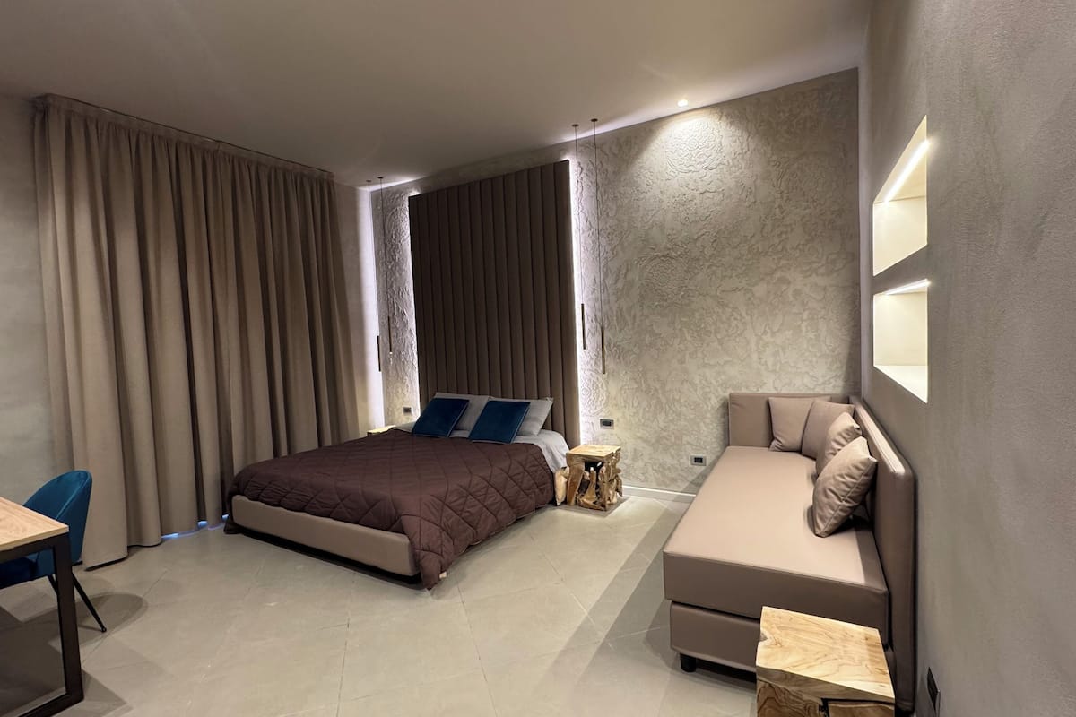 Deluxe Triple Room, 1 King Bed with Sofa bed, Balcony, City View | In-room safe, blackout drapes, soundproofing, iron/ironing board