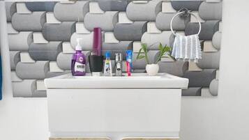 Hair dryer, towels, soap, shampoo