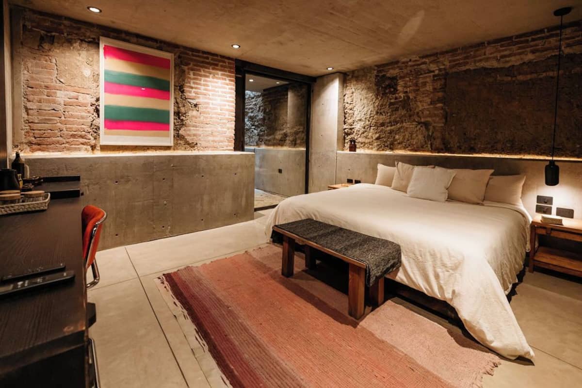 Deluxe Double Room, Courtyard View | Desk, blackout drapes, iron/ironing board, free WiFi