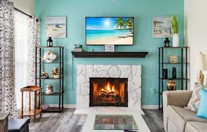 Smart TV, fireplace, books, offices