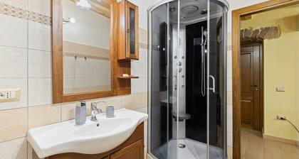 Chambre 'Urania' avec terrasse commune, Wi-Fi et climatisation