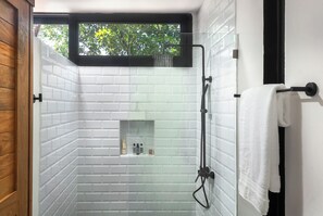 Shower, hair dryer, towels, soap