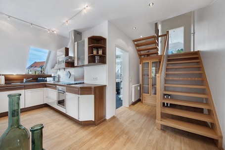 Fridge, microwave, oven, stovetop. Apartment 'Hus An´t Water' with Sea View, Wi-Fi and Air Conditioning