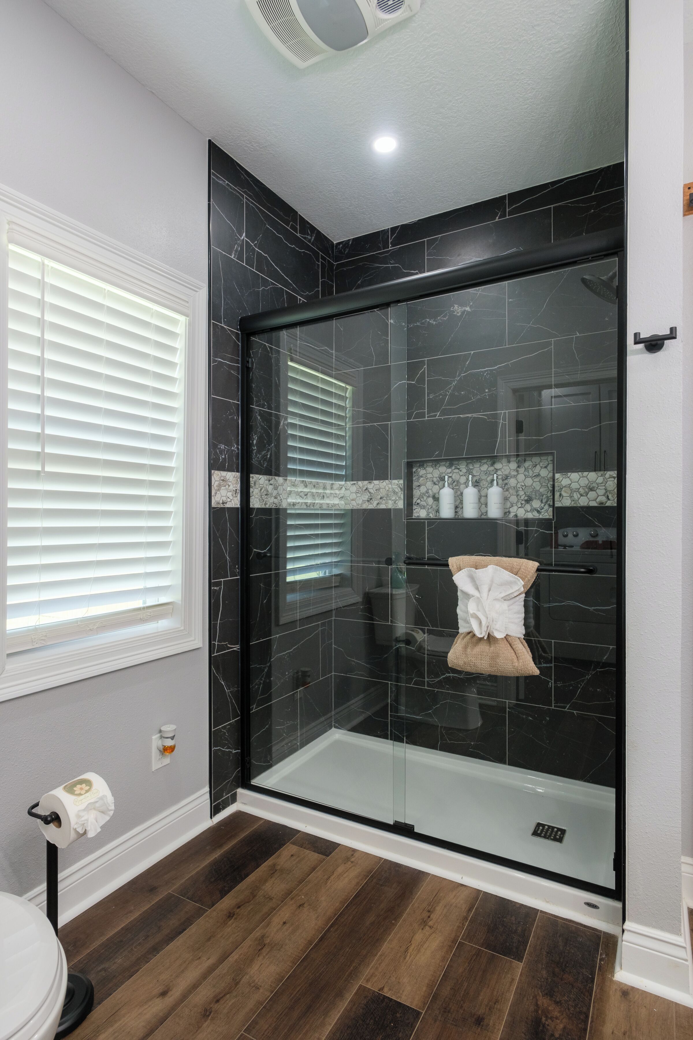 Shower, hair dryer, towels, soap