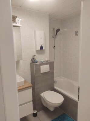 Hair dryer, towels, toilet paper